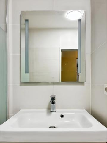 Saint-Gilles les Bains – T2 raffiné aux prestations soignées, varangue, jardin privatif et garage box