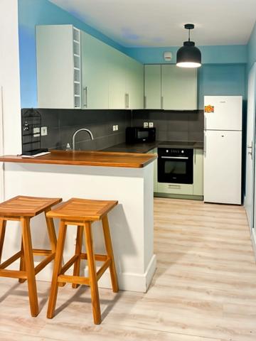 Saint-Gilles les Bains – T2 raffiné aux prestations soignées, varangue, jardin privatif et garage box