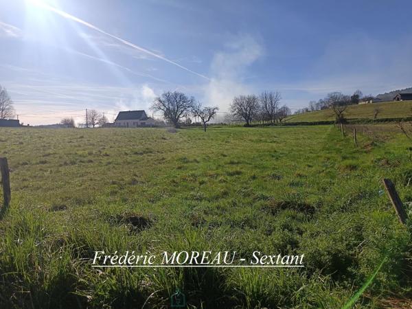 Trés beau terrain constructible double accès.