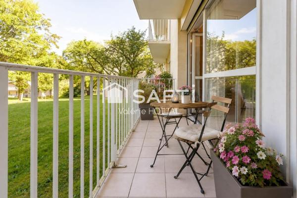 Appart 104m2 avec cave et parking dans parc arboré