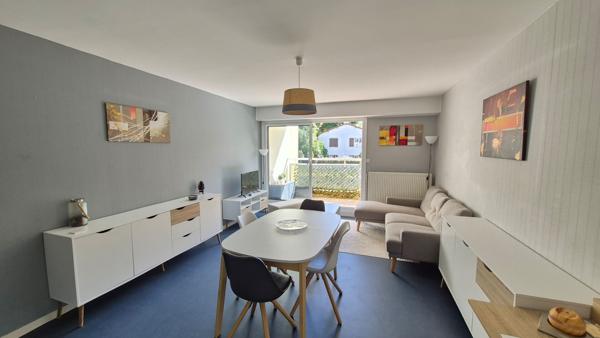 Appartement T3 avec balcon, stationnement couvert et cave