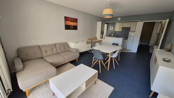 Appartement T3 avec balcon, stationnement couvert et cave