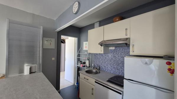 Appartement T3 avec balcon, stationnement couvert et cave