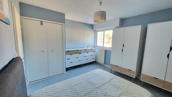 Appartement T3 avec balcon, stationnement couvert et cave