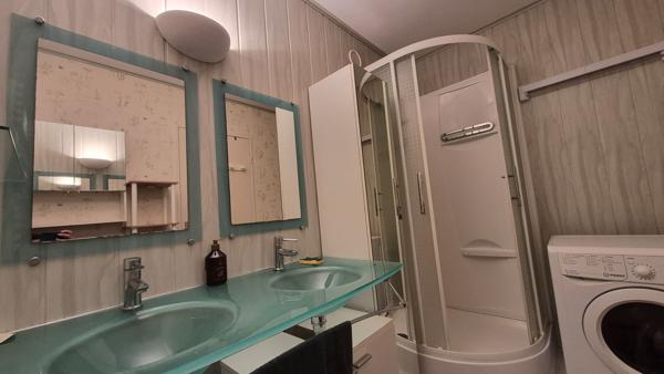 Appartement T3 avec balcon, stationnement couvert et cave