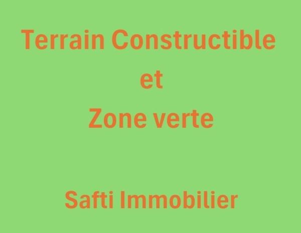 Terrain constructible et zone verte