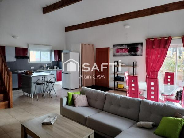 Appartement de 121m² avec mezzanine terrasse et parking dans une maison divisée en 2 logments