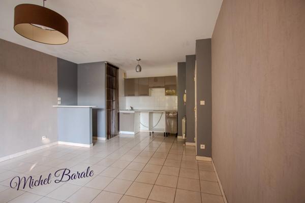 Appartement Tassin-la-Demi-Lune – 38 m² avec terrasse, idéalement situé, garage possible.