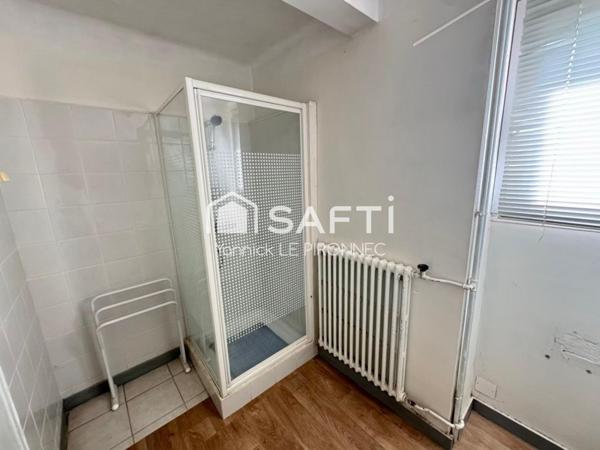 Maison T6-123 m² centre-ville Peaule