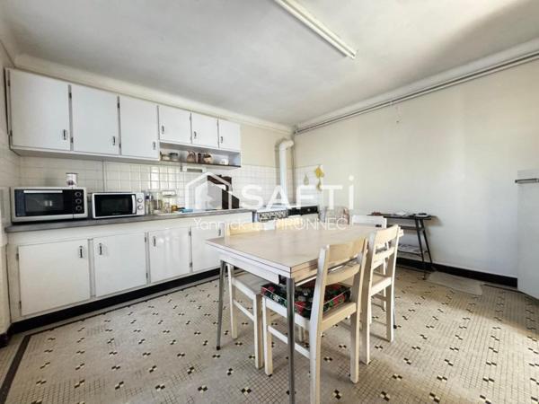 Maison T6-123 m² centre-ville Peaule