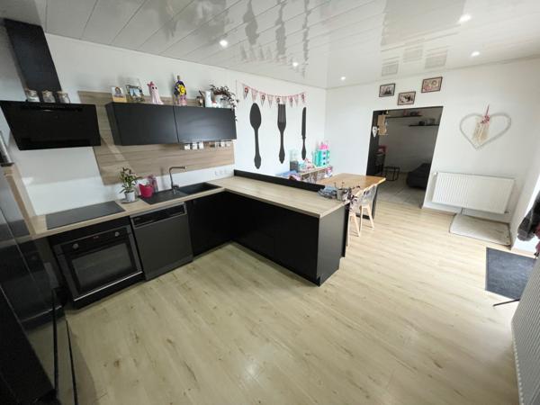 Maison mitoyenne F5 avec terrain, terrasse, parking et garage