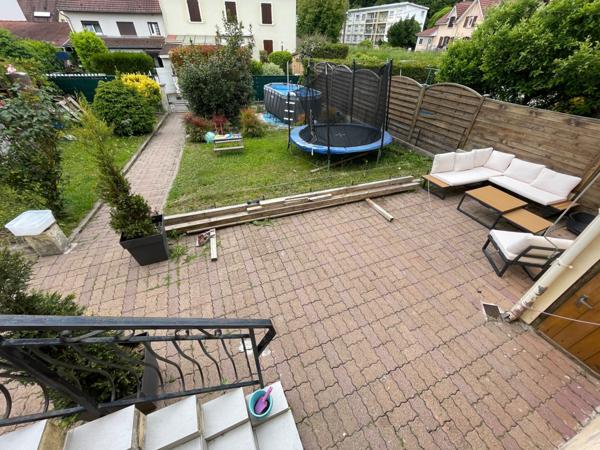 Maison mitoyenne F5 avec terrain, terrasse, parking et garage