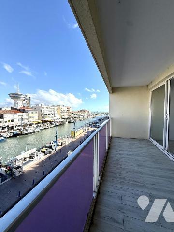 Appartement traversant avec deux terrasses vue canal
