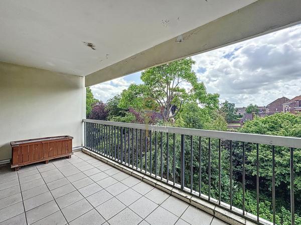 En plein coeur de Mouvaux appartement T4