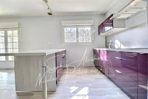 Ensemble immobilier composé de deux habitations avec sous-sol et terrain