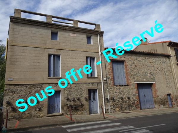 Ensemble immobilier ( logement F4, grange et jardin)
