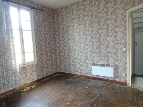Ensemble immobilier ( logement F4, grange et jardin)