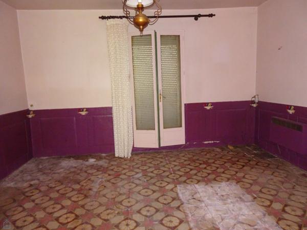 Ensemble immobilier ( logement F4, grange et jardin)