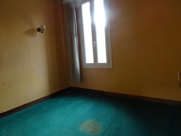 Ensemble immobilier ( logement F4, grange et jardin)