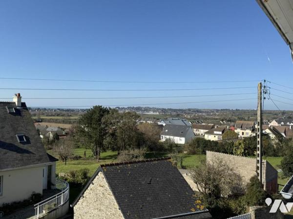 Maison en coeur de bourg au calme et avec vue dégagée