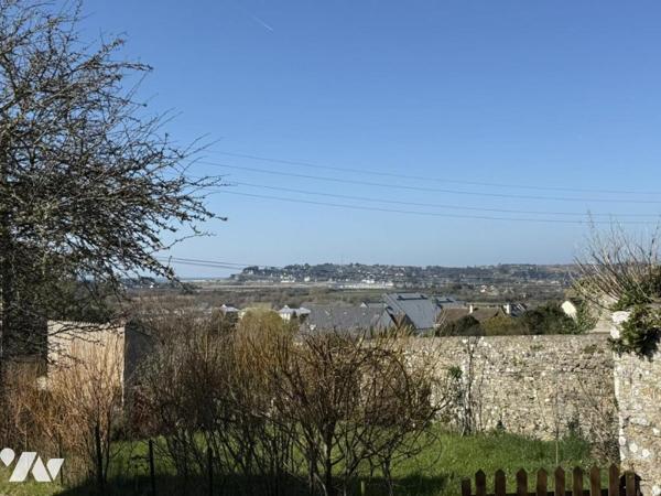 Maison en coeur de bourg au calme et avec vue dégagée