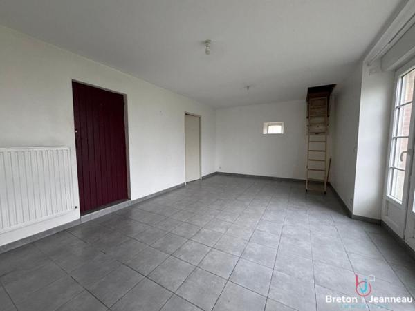 Maison en pierres à Loiron-Ruillé