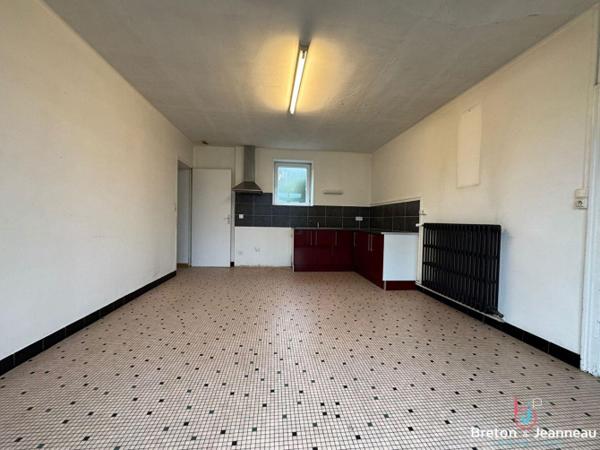 Maison en pierres à Loiron-Ruillé