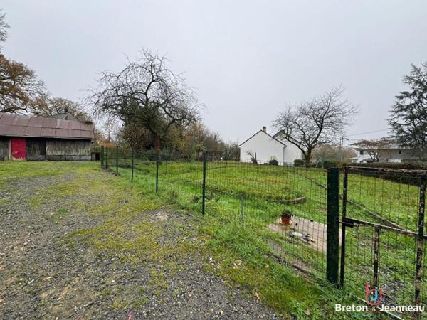 Maison en pierres à Loiron-Ruillé