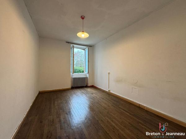 Maison en pierres à Loiron-Ruillé