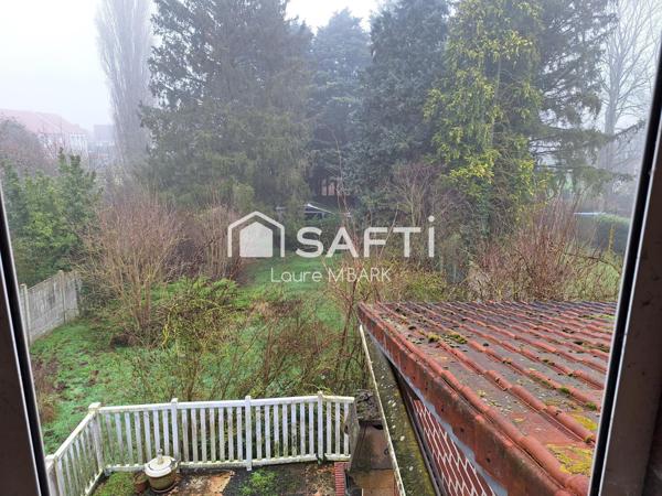 MAISON CENTRE VILLE AVEC TERRAIN