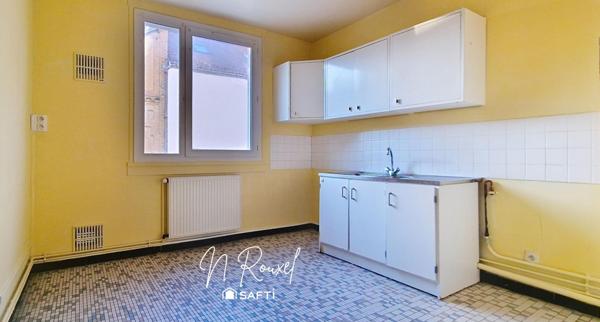 Appartement 3 pièces avec cave et parking en centre-ville