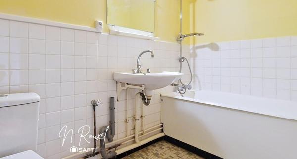 Appartement 3 pièces avec cave et parking en centre-ville