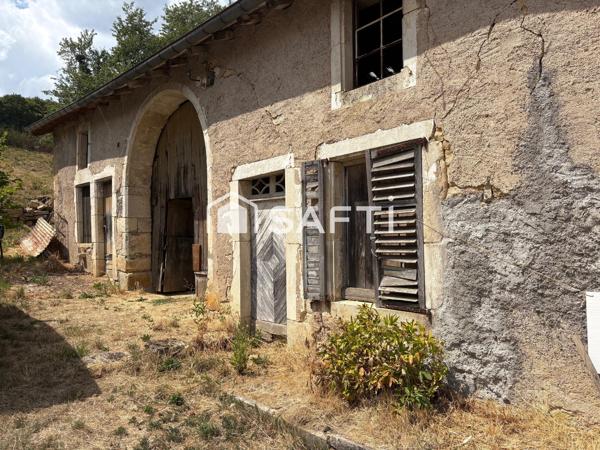 Ancienne grange sur un terrain de 1200 m2  offrant de belles perspectives d'agencements