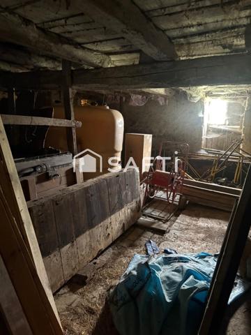 Ancienne grange sur un terrain de 1200 m2  offrant de belles perspectives d'agencements