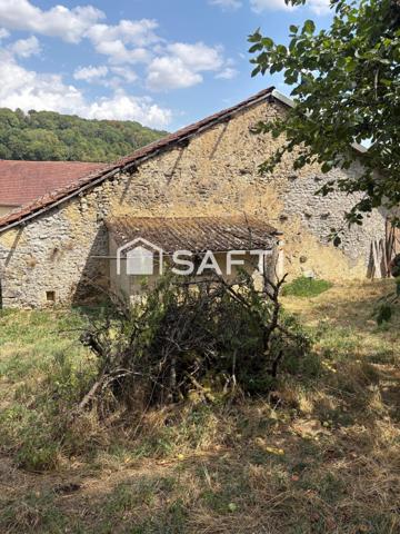 Ancienne grange sur un terrain de 1200 m2  offrant de belles perspectives d'agencements