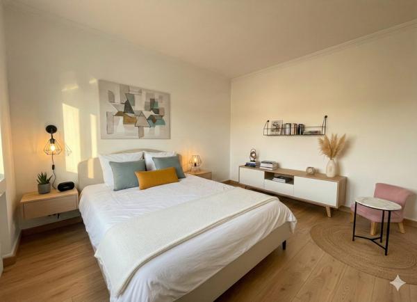 Maison individuelle avec double logement – Terrasses, stationnements et emplacement stratégique