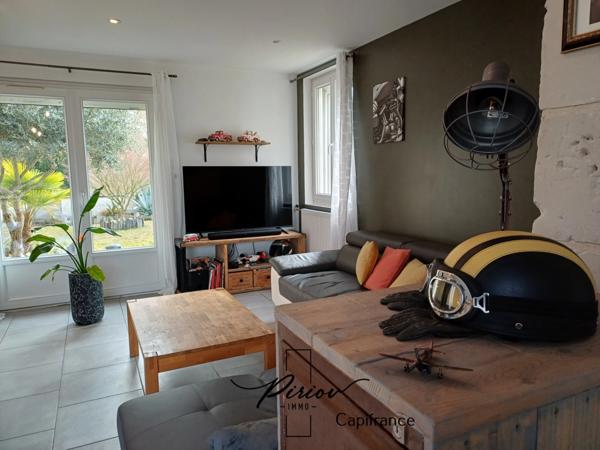 Maison - plain pied - grands garages dont accueil camping car