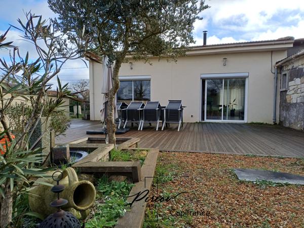 Maison - plain pied - grands garages dont accueil camping car