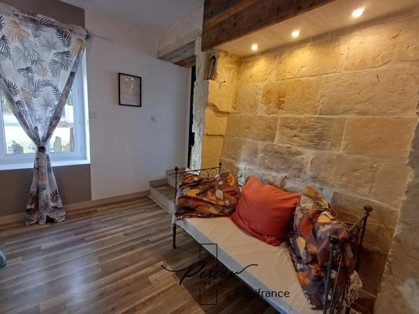 Maison - plain pied - grands garages dont accueil camping car