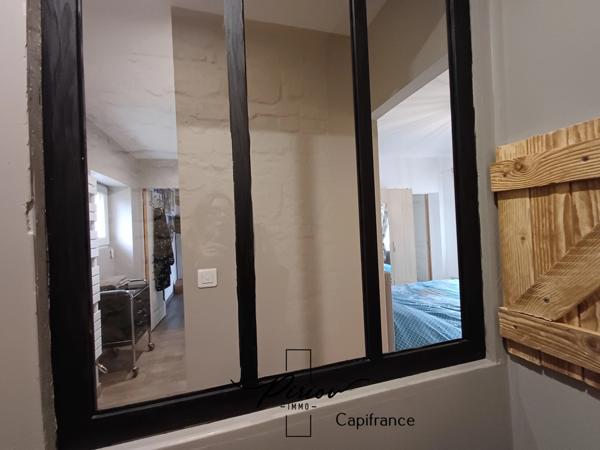 Maison - plain pied - grands garages dont accueil camping car