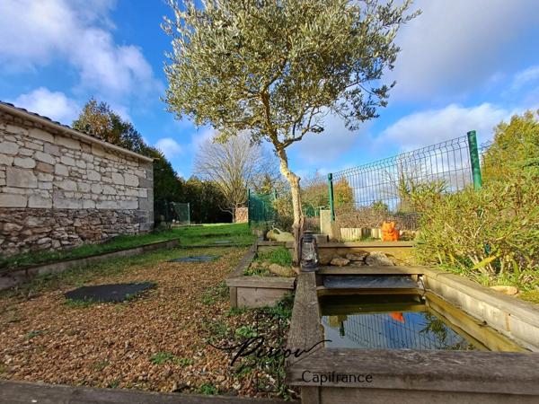 Maison - plain pied - grands garages dont accueil camping car