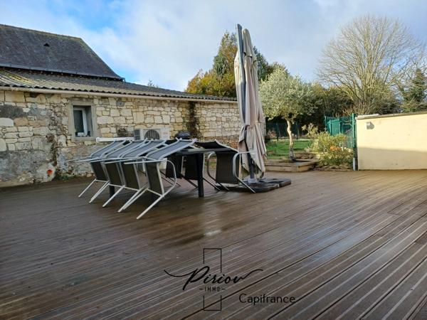 Maison - plain pied - grands garages dont accueil camping car