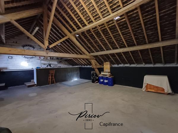 Maison - plain pied - grands garages dont accueil camping car