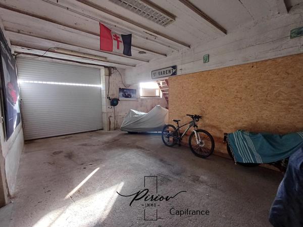 Maison - plain pied - grands garages dont accueil camping car