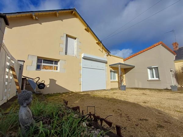 Maison - plain pied - grands garages dont accueil camping car