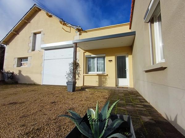 Maison - plain pied - grands garages dont accueil camping car