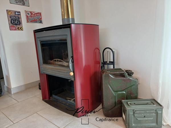 Maison - plain pied - grands garages dont accueil camping car