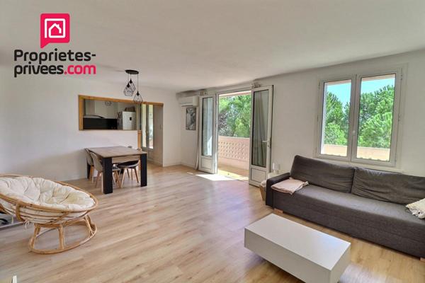 Appartement 2 chambres 72 m2, cave et garage