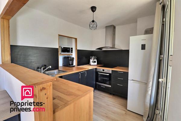 Appartement 2 chambres 72 m2, cave et garage