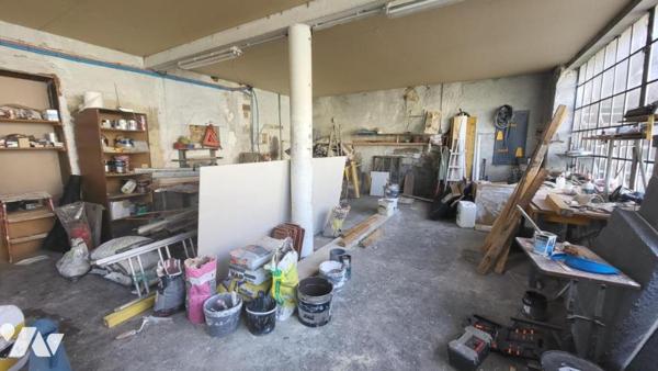 Immeuble quatre appartements et un atelier sur 6a 98ca de terrain